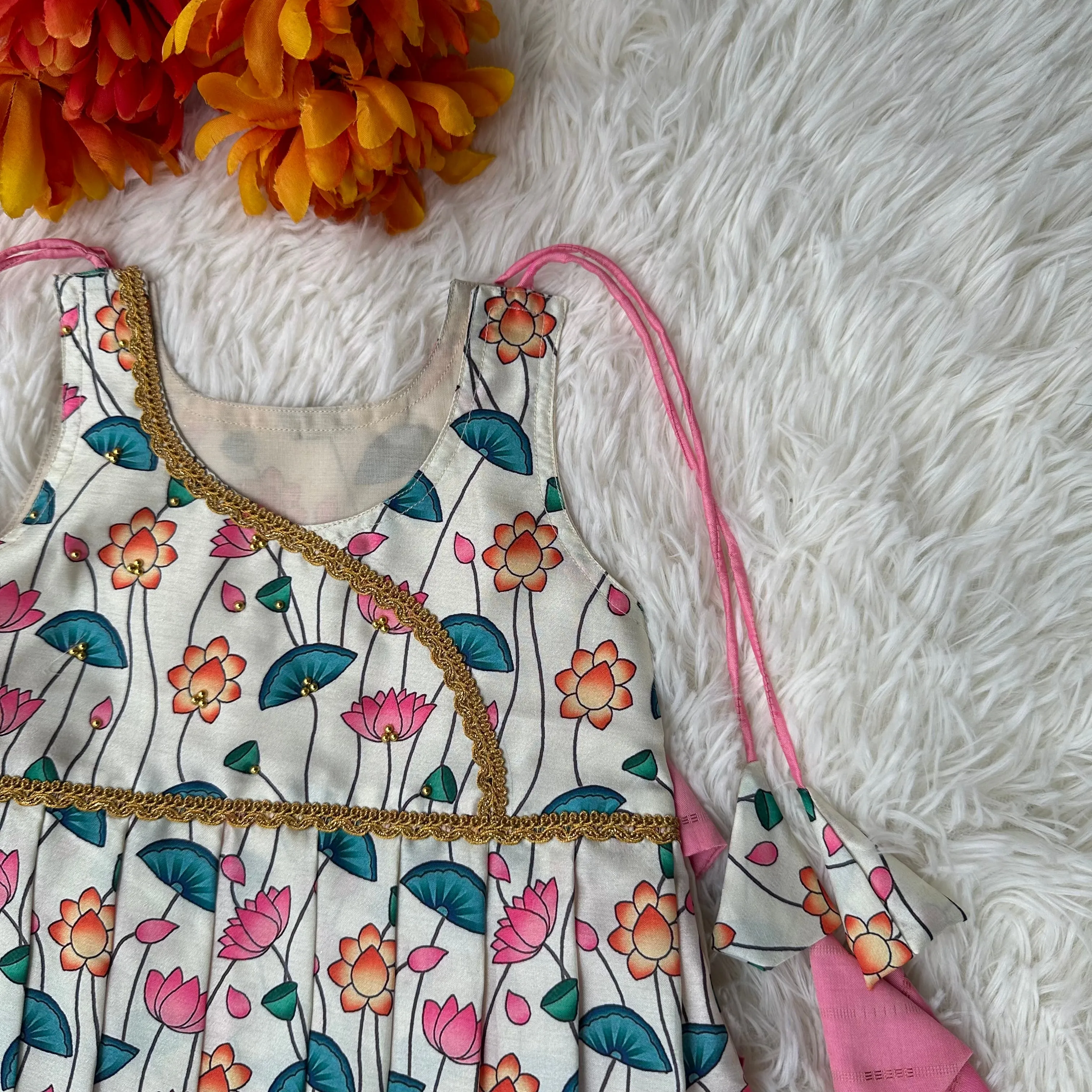 Pichwai print Shoulder Tie frock: Milk White, Pink, Tussar silk elegance.